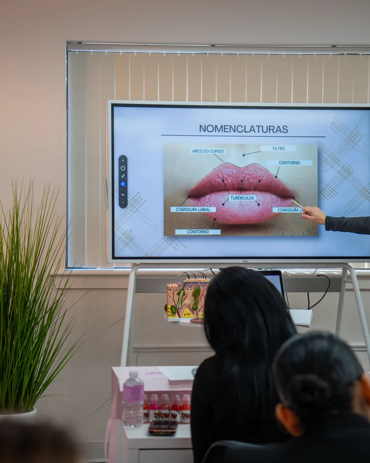 Adriana teaching a permanent makeup class at the Peabody academy