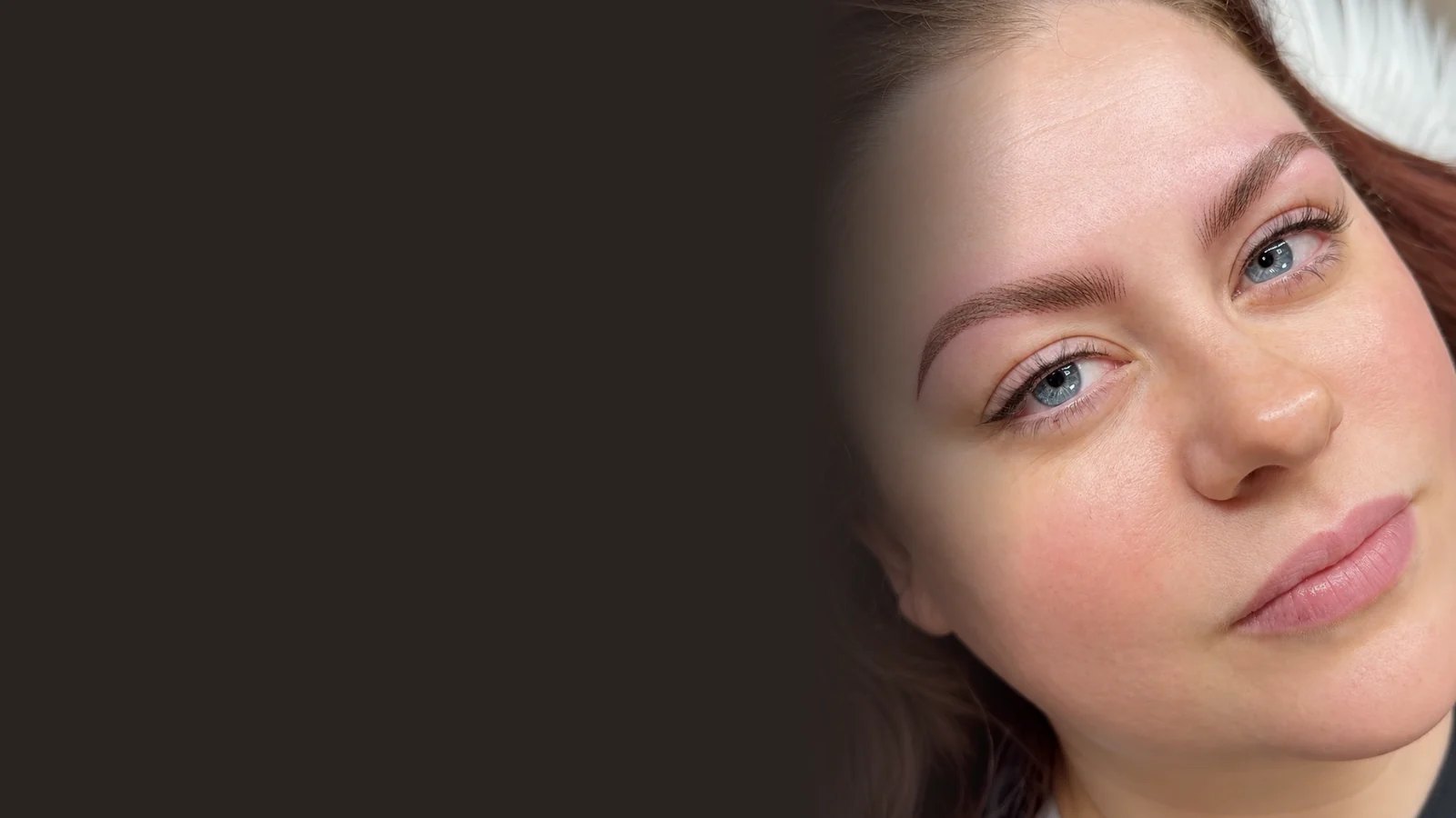 Healed permanent eyeliner on a client, drawn close to the upper lash line