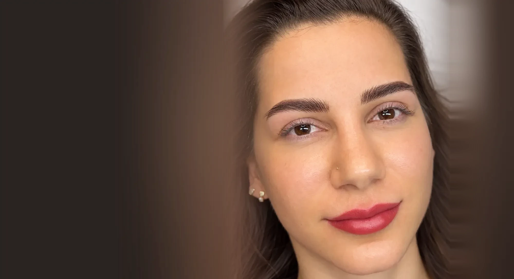 Lip Blush result on a client, with balanced colour and a defined lip border