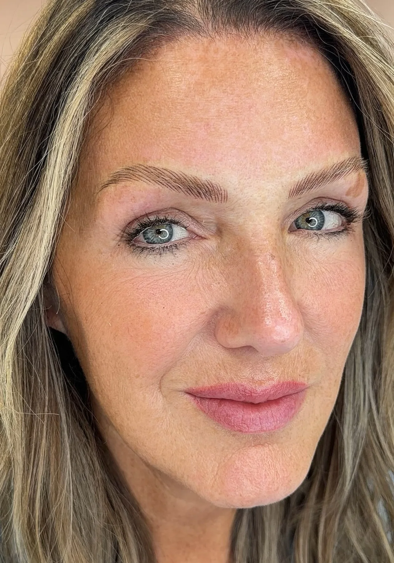 Healed Nano Brows with visible hair strokes on a client of Adriana's Permanent Makeup