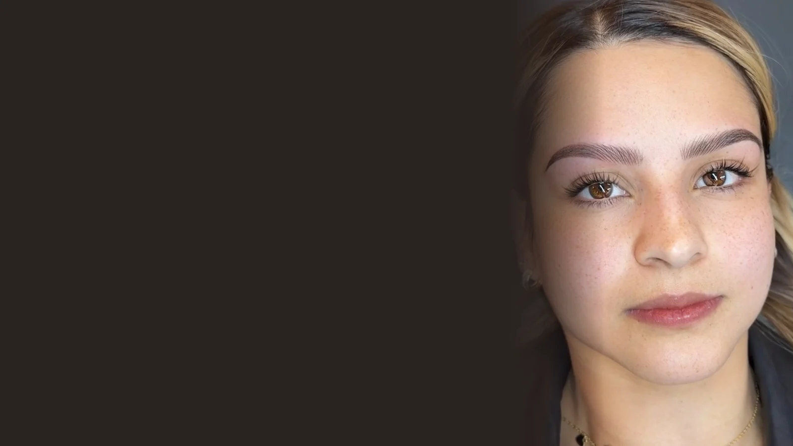 Healed Nano Combo Brows on a client, with hair-like strokes softened by powder shading