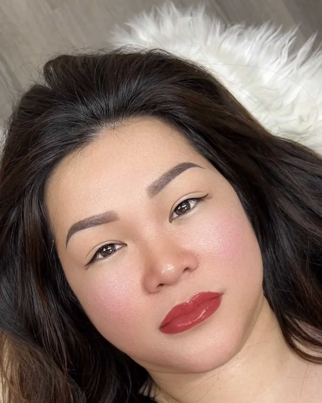 Healed brows and lips done together, the brow shape and the lip tone balanced against each other