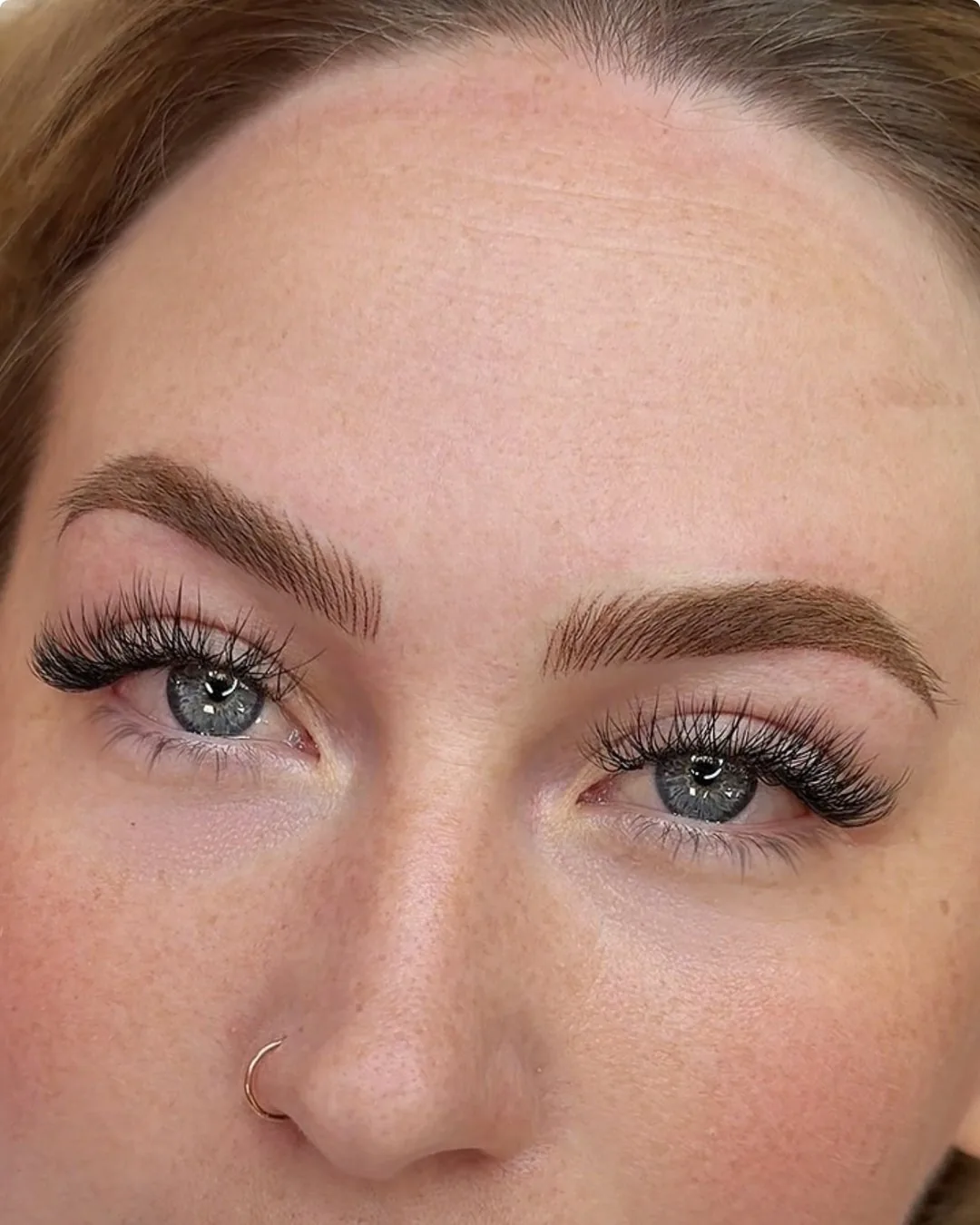 Refreshed permanent makeup brows after a yearly touch-up